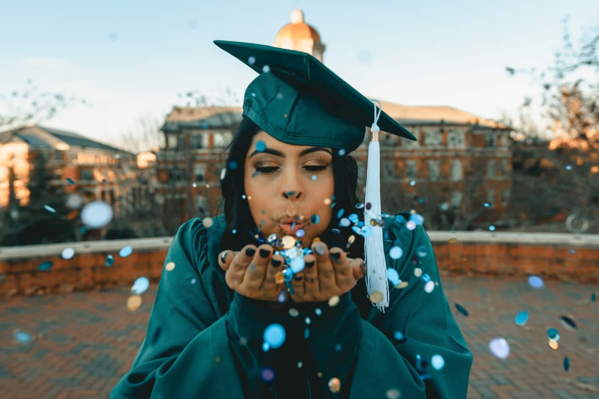 Female Graduate Celebrating Her Diploma