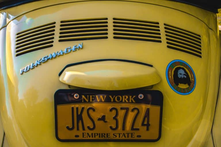 New York License Plate on Yellow Volkswagon