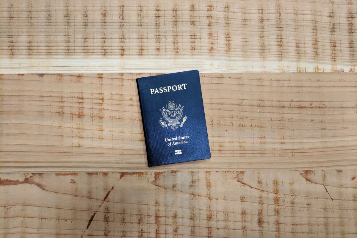 U.S. Biometric Passport on Wooden Table